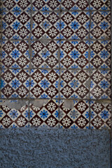 Traditional old tiles wall on the street, azulejos ceramic tilework. Porto, Portugal.