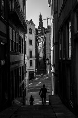 View of on one of the little streets in the historical center of Porto, Portugal. Black and white photo.