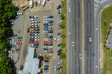 Asphalt road in the many cars through a small town