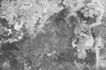 Vintage grunge facade background. Abstract photography. Black and white image.