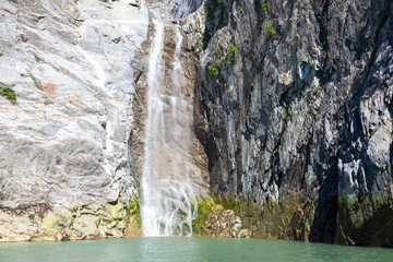 Fototapeta na wymiar Waterfall in tracy arm fjord in Alaska