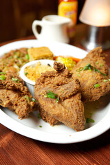 A plate of southern fried chicken.