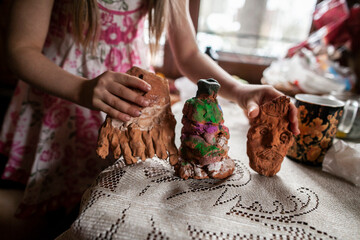 Children's homemade toys made of clay, medium plan, side shooting