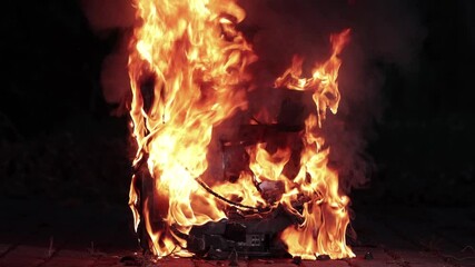 TV burning with broken screen - Powered by Adobe