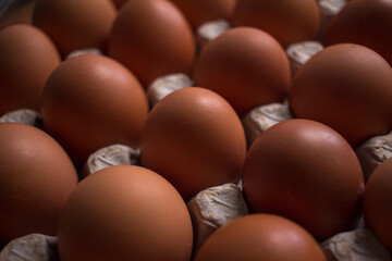 Obraz na płótnie Canvas eggs in carton closeup