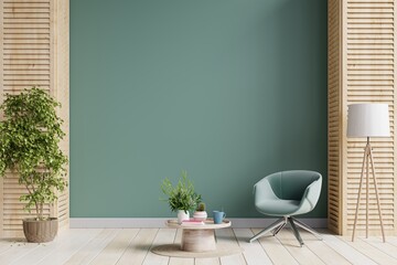 Green armchair and a wooden table in living room interior with plant,dark green wall.