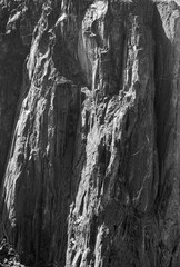 Craggy rock face viewed from the North Rim Trail - Black and White