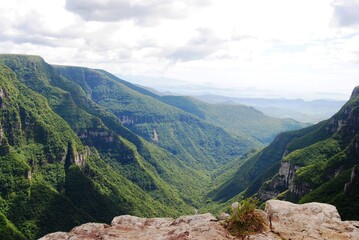 Fototapeta na wymiar Beautiful landscape in canyon with stunning green view in Rio Grande do Sul, Brazil. mountain weather