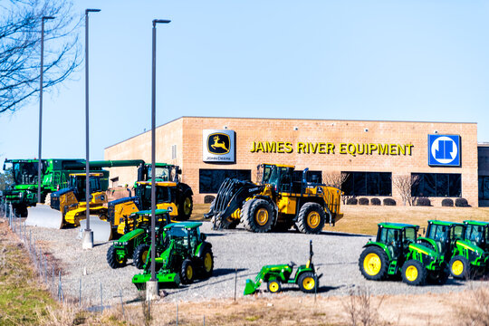 Richmond, USA - March 5, 2021: Sign for James River Equipment local rental agency for John Deere renting heavy machinery for construction sites