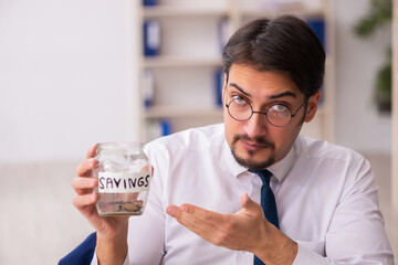 Young male bookkeeper in pension concept