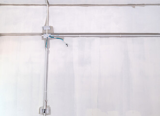 White electric pvc conduit pipe in dormitory.