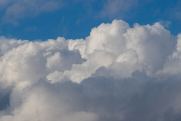 Naklejka na ściany i meble Layer of clouds on the blue sky.