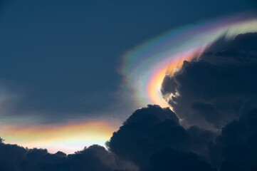 Fototapeta na wymiar Iridescent Pileus Cloud on the sky