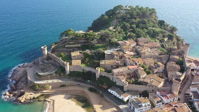 Scenic view from drone of Spanish town of Tossa de Mar, famous tourist destination in Spain. High quality 4k footage