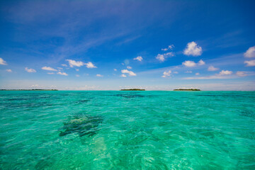 Three small islands and turquoise blue lagoon in Kayangel atoll, Palau, Oceania © Hiromi Ito Ame