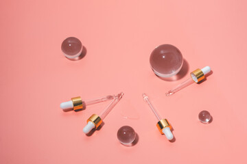 Dropper glass bottles with pipette. Transparent hyaluronic natural beauty product and eco serum skin care concept. Top horizontal view copyspace.