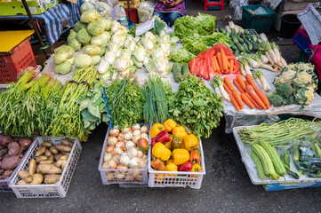 Asian fruits and vegetables sell in local market. Asian market is a local food store that primarily caters to a single particular Asian cultural group.