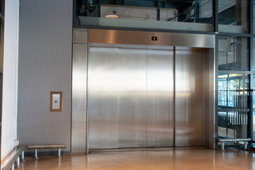Lift doors, service and cargo closed elevators, stainless steel elevator © pinglabel