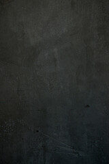 Concrete wall texrture of black, dark grey or gray color.