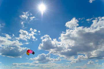 A colorful kite floats in the sky