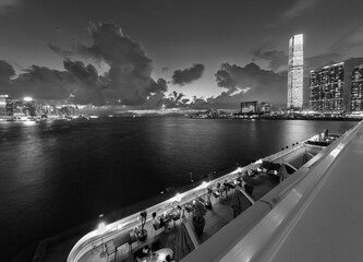 Naklejka premium Panorama of Victoria Harbor of Hong Kong city at dusk