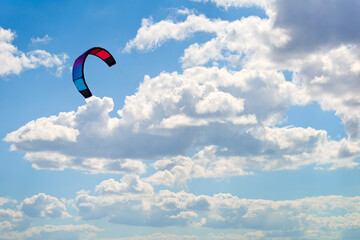 A colorful kite floats in the sky