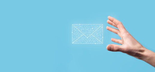 Male hand holding letter icon,email icons .Contact us by newsletter email and protect your personal...