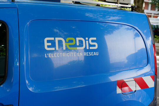 Enedis edf logo sign and brand text on side panel van truck blue electricity provider distribution company french