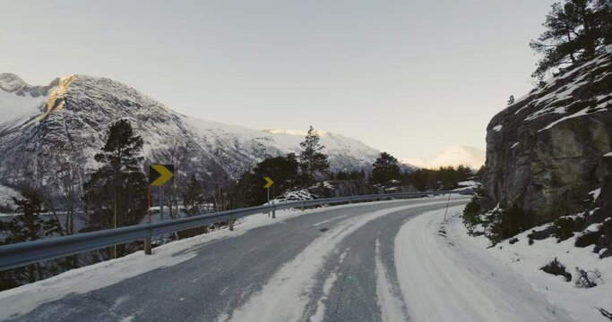 Beautiful View Of The Snowy Mountains In A Leisurely Drive In Eresfjord Norway - medium shot