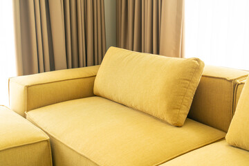 empty yellow fabric sofa in living room