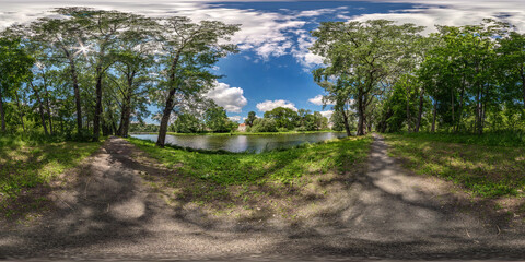 full seamless spherical hdri panorama 360 degrees angle view among old poplar grove in forest near lake in sunny day in equirectangular projection, ready VR AR content