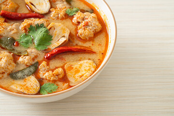 spicy boiled pork soup with mushroom - Tom Yum