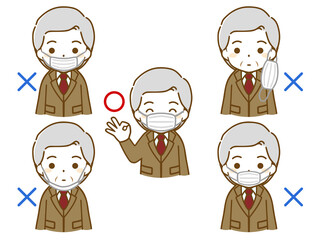 マスクをしているスーツの高齢男性