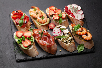Appetizers board with traditional spanish tapas set. Italian antipasti snacks