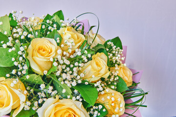 Beautiful bouquet of yellow roses. Bouquet for interior decoration or as a present. Floral card...