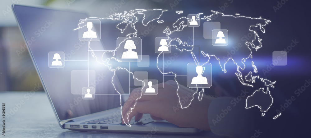 Poster Close up of hands using laptop and smartphone with glowing map and people icons. Social media and online recruiting concept. Double exposure.