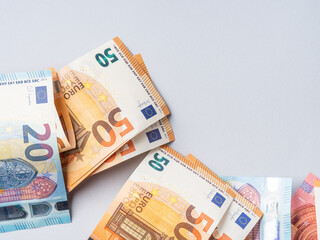Euro money currency banknotes frame on blue background