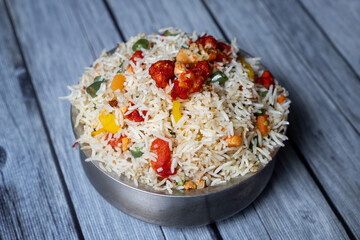 Tasty gobi fried rice on a wooden table