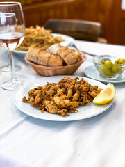 Fried small squids with lemon and white bread, Mallorca, Puerto Andratx, Mallorca, Spain
