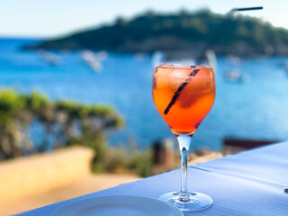 Aperol Spritz by the sea, Sant Elm, Mallorca, Spain