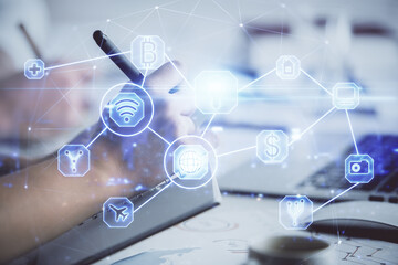 Double exposure of social network theme drawing over people taking notes background. Concept of human connection