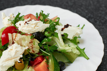 Salad with cheese and fresh vegetables. Greek salad.