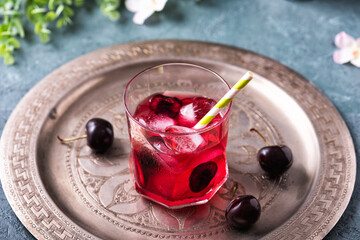 Cold sweet cherry non alcohol drink with ice