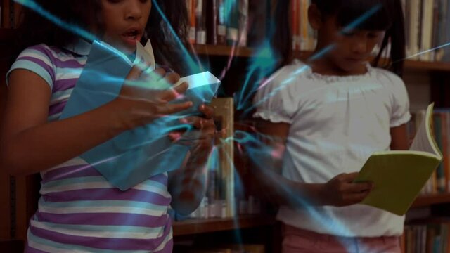 Blue digital waves against two african american girls reading a book at library