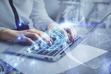 Double exposure of woman hands typing on computer and technology theme drawing. High Tech concept.