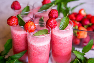 Strawberry smoothie with fresh berries with meant