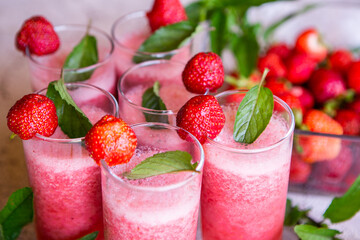 Strawberry smoothie with fresh berries with meant