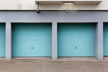 Vintage blue garage doors and a lamp in the Netherlands
