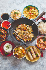 Asian oriental food composition in colorful dishware