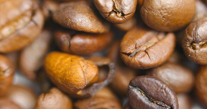 Pile of roasted coffee beans closeup photo